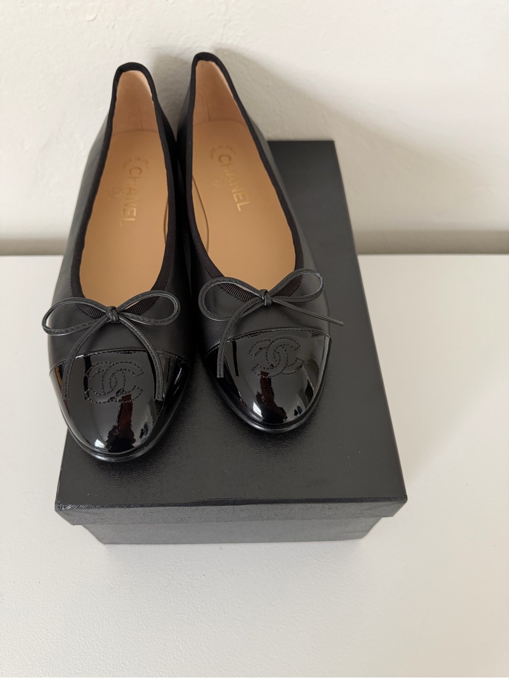 CHANEL Black Patent Cap-Toe Bow Ballet Flats
